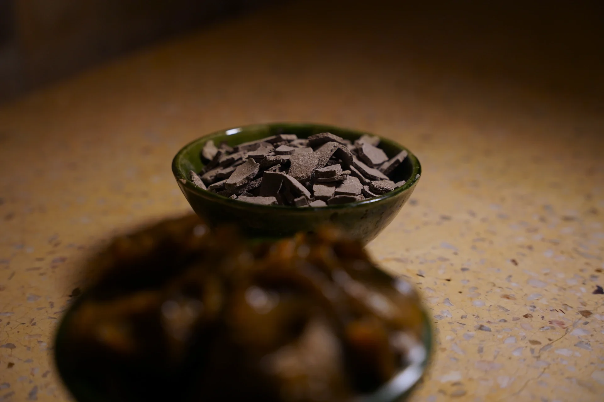 Bowl of crushed ghassoul clay