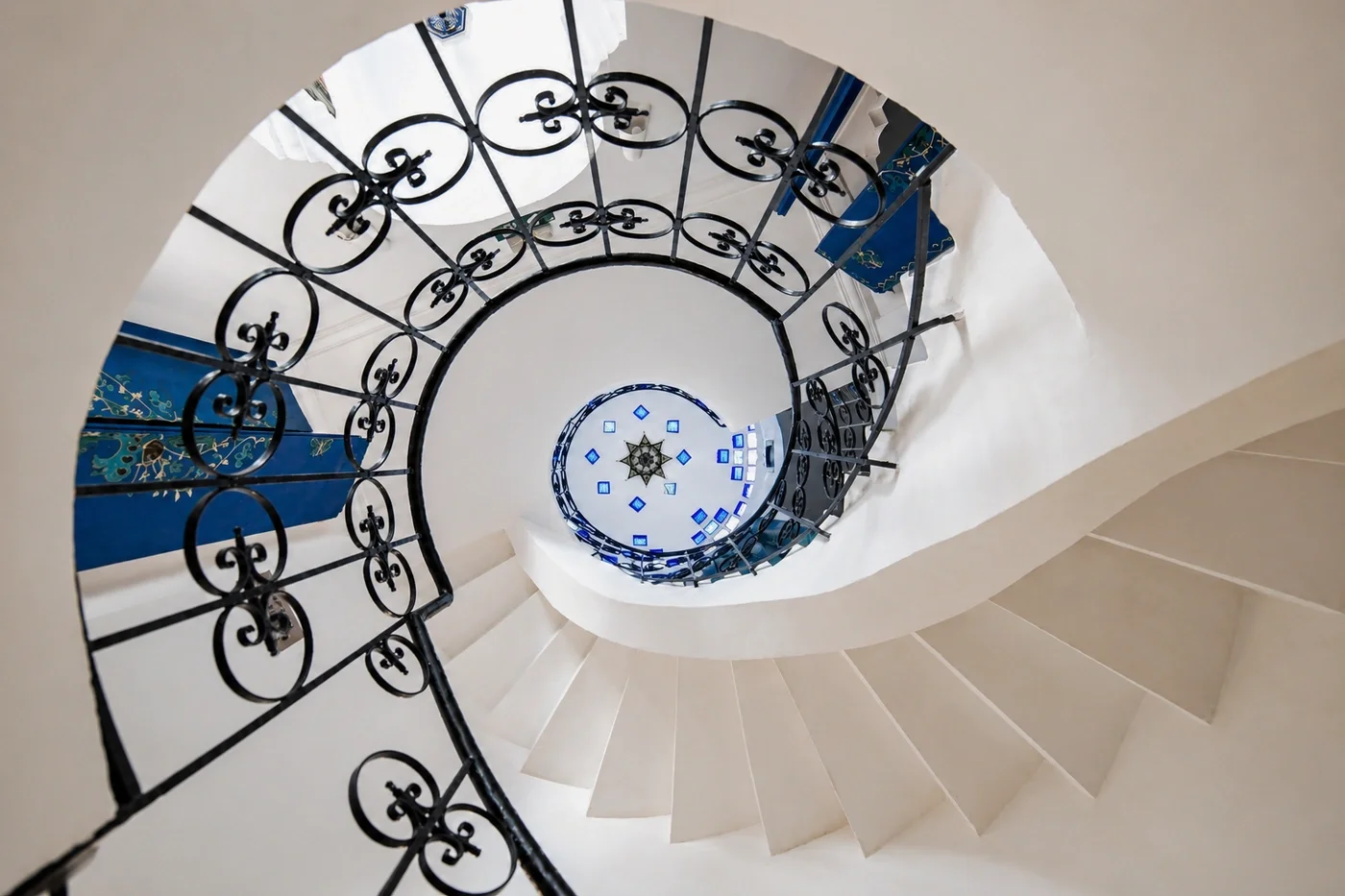 Top view of the spiral staircase with a star-shaped stained glass window