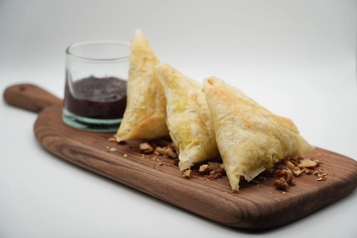Cheese and Leek Briuats with Forest Berry Sauce