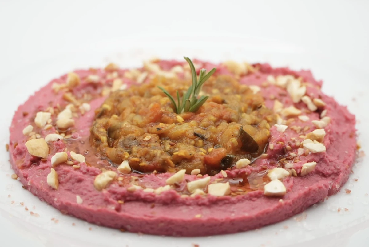 Zalouk with pink humus and cashews